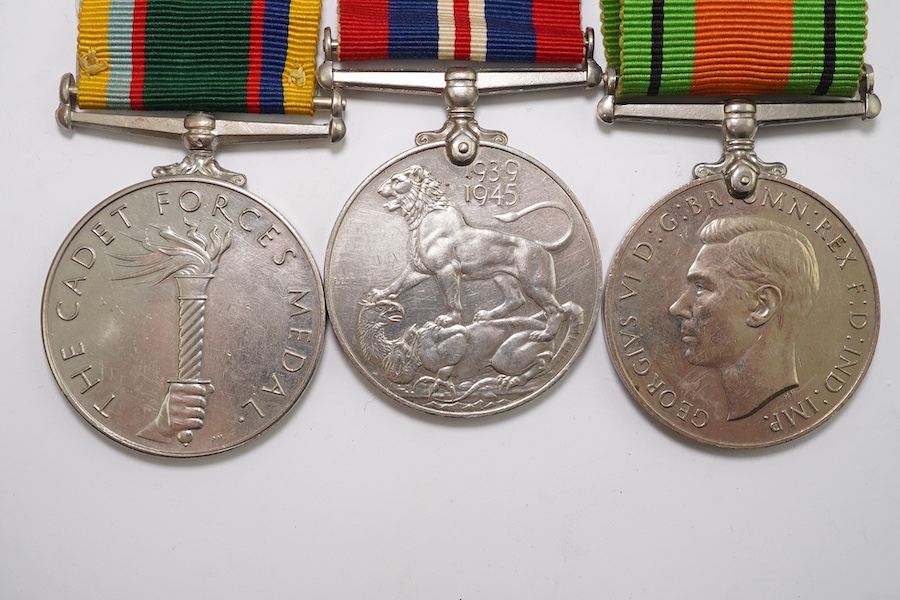 A group of assorted medals; WW2/ERII Cadet Forces medal group of 3 with two clasps to Fg.Off.W.K.Winstone R.A.F.V.R.(T); ERII RAFLSGC to Cpl B.K.Stockwell (F2570477) in box; WW2 Dm & WM. Condition - fair to good.